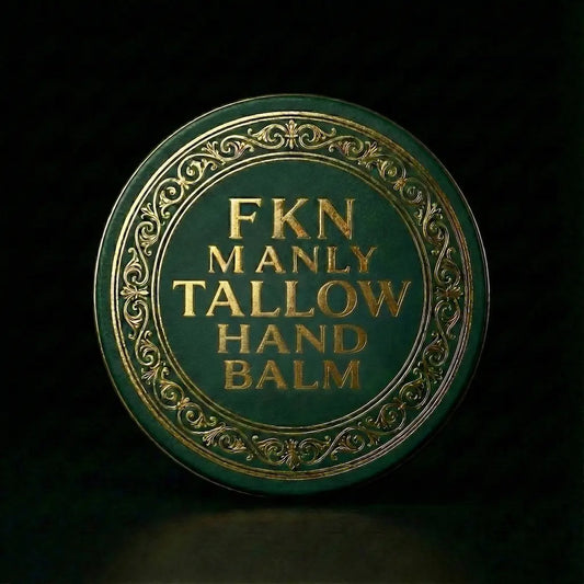 Round container of FKN Manly Grass Fed Tallow Hand Balm with decorative gold text on a dark background