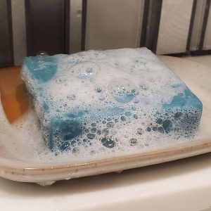 Fkn Manly Arctic Mountain Soap Covered In Suds In A Soap Dish